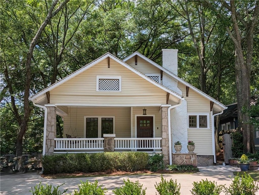 Traditional bungalow in the heart of Oakhurst with an incredible deep lot and wonderful front porch!