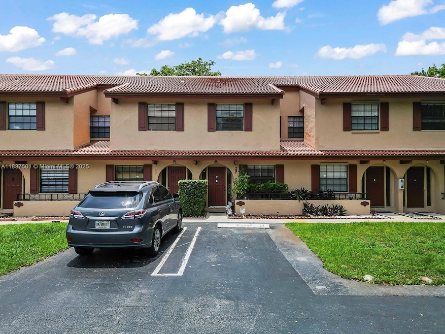 10942 W Sample Rd unit E1, Coral Springs, FL 33065 - photo 1