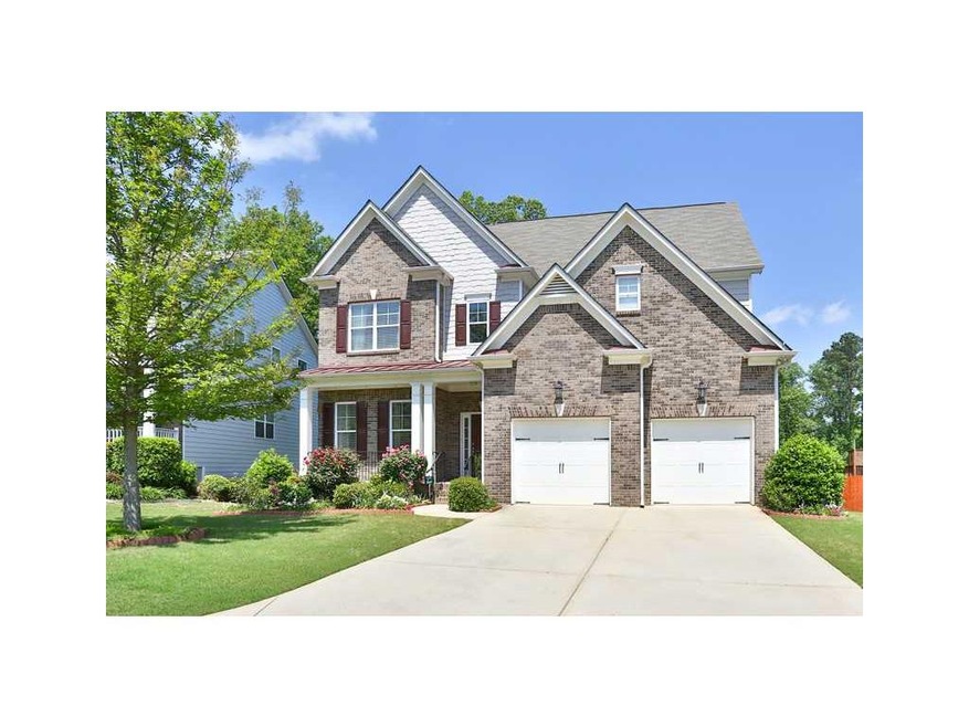 Exterior Front. Beautiful custom home located minu