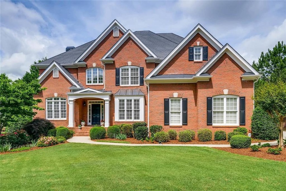 Lovely 4-sides brick traditional home on large cul