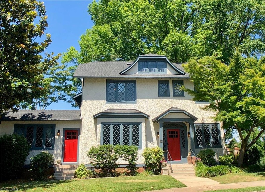 903 West End Blvd facade with unique casement windows and double entry.