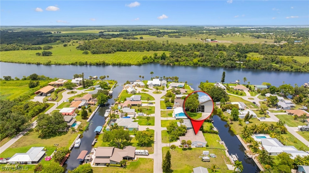 Aerial view of residential area with a nearby body