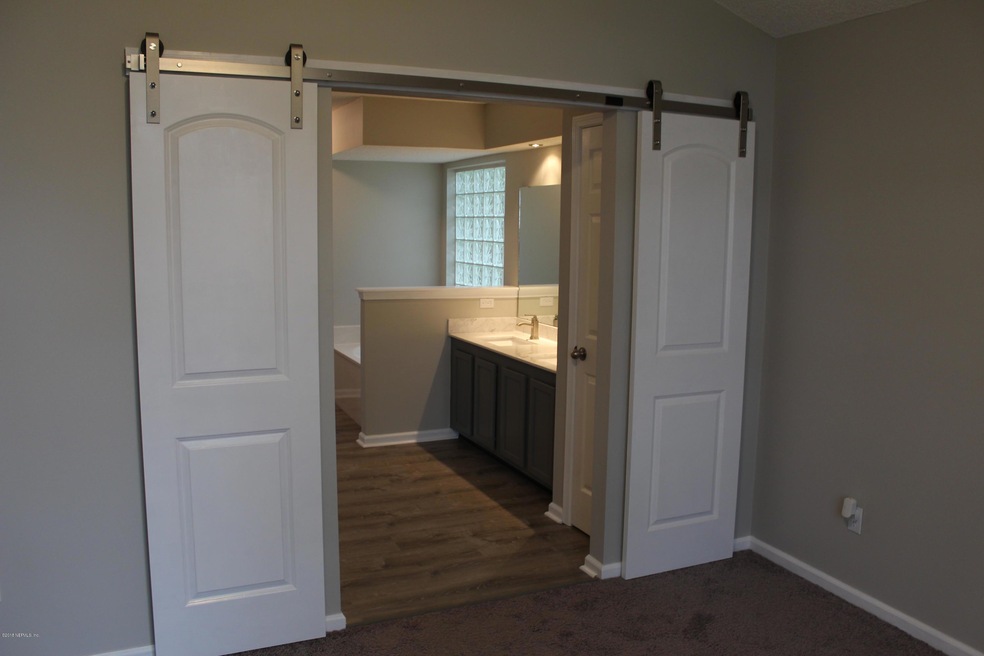 Barn Doors leading to Master Bath
