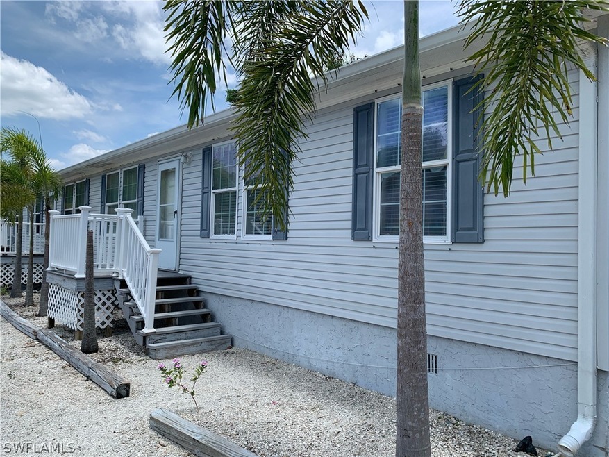 5527 Judith Rd unit 1, Bokeelia, FL 33922 - photo 1