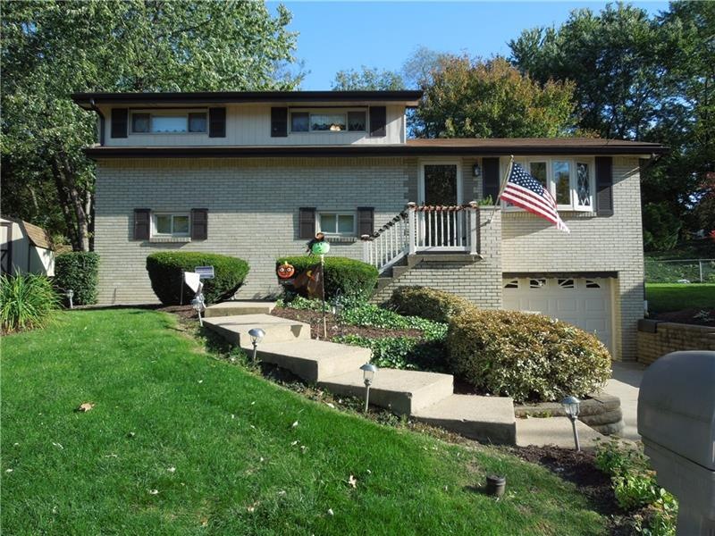 Amazing curb appeal.  Beautiful brick home with 1 