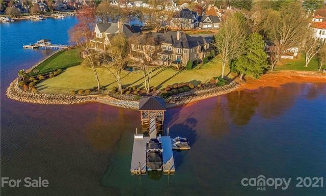 Fabulous point lot home with 275+ ft of shoreline.