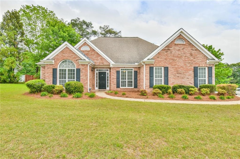 View of front of property with roof with shingles,