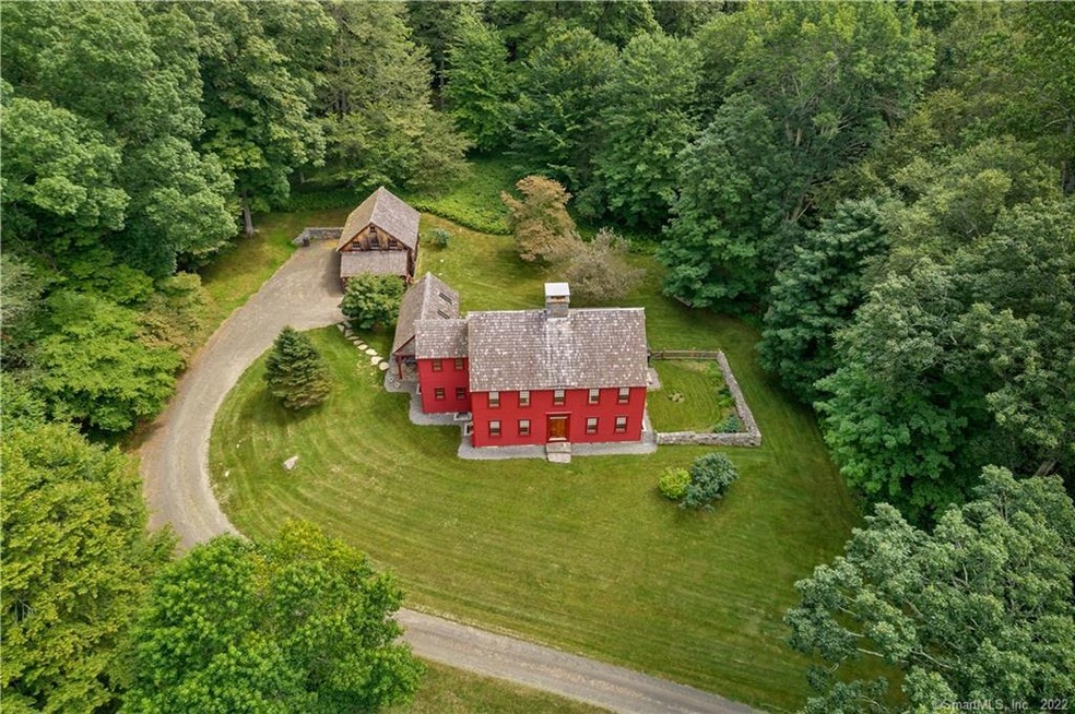 PRIVATELY sited on 12.97 acres. Property abuts Lan
