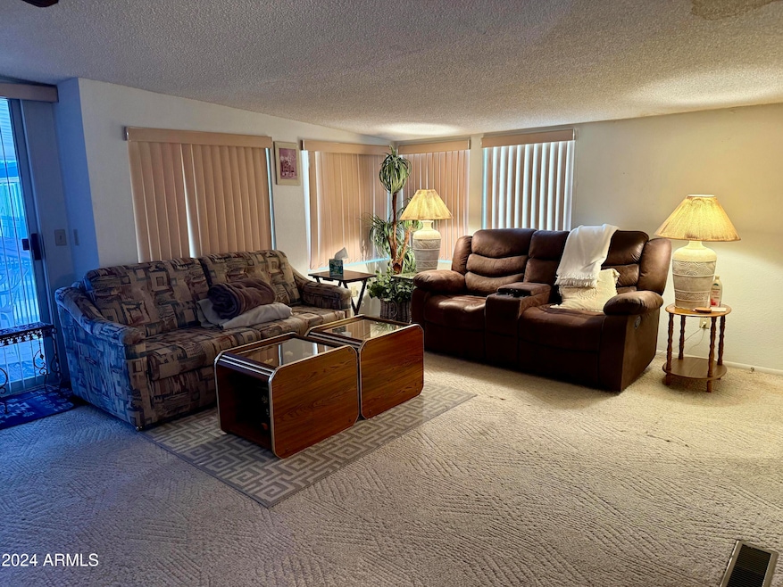 7750 E. Broadway Rd. #149