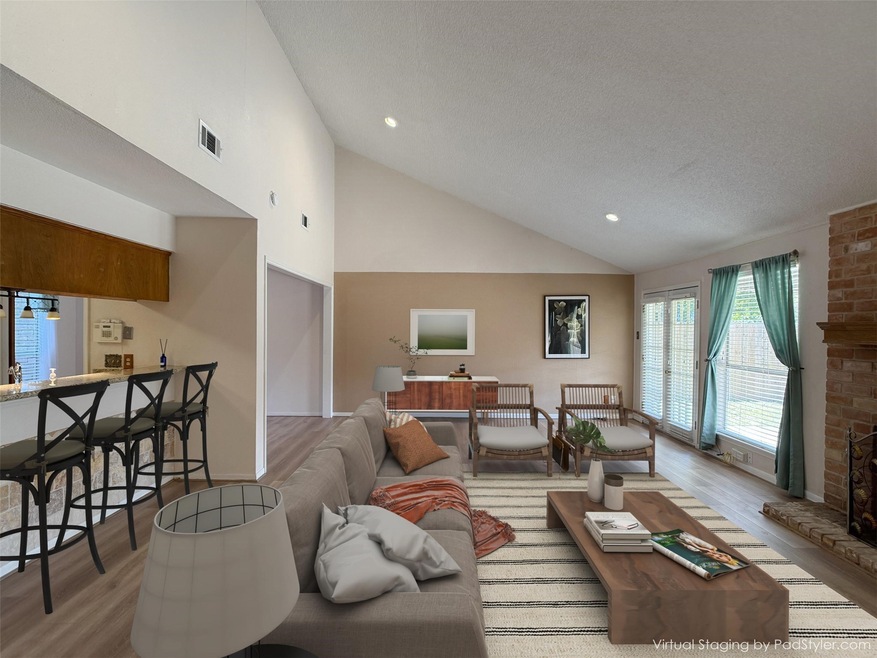vaulted ceiling over large family room with possib