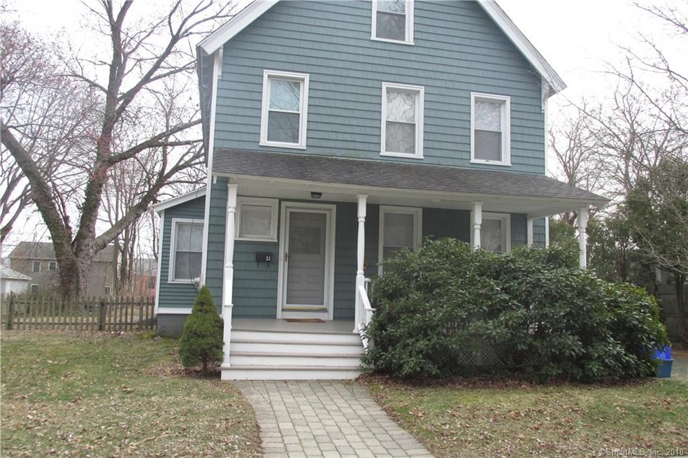 Front View...Stone front walk, vinyl siding.