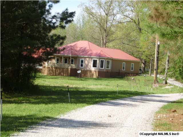 A pleasant winding gravel road to the Home