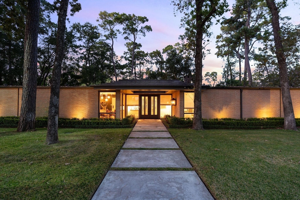 Exceptional Mid Century masterpiece nestled in coveted Hunter's Creek. Extensively renovated; 