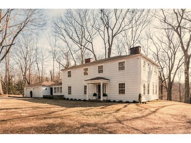 Statuesque Mid-Century Colonial situated on stunni