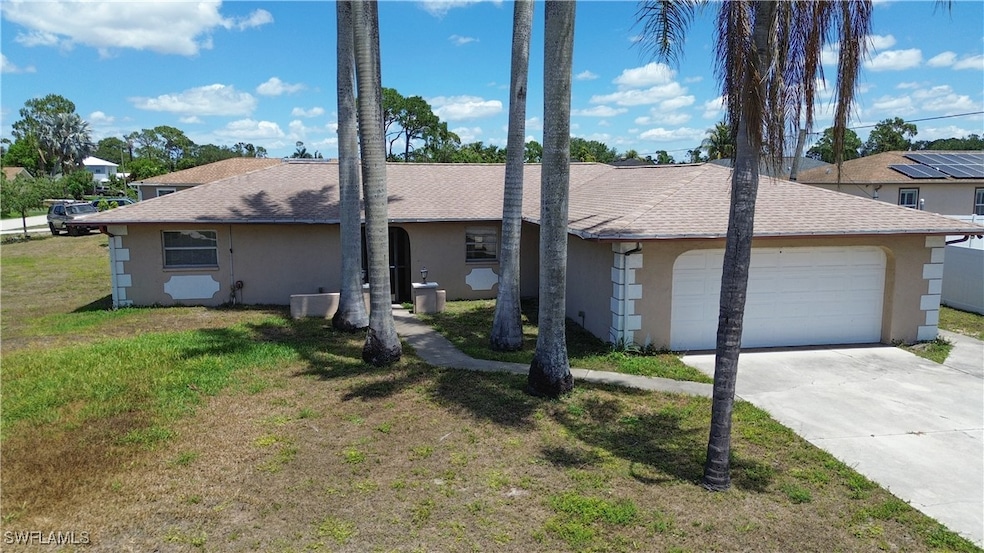 Single story home featuring an attached garage, dr