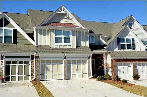 Exterior Front. CHARMING TOWNHOME WITH TWO CAR GAR