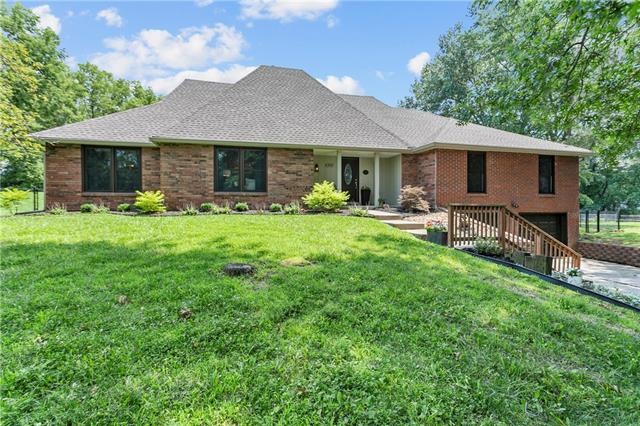 The home sits on a very quiet cul-de-sac just as you enter Weatherby Lake off Barry Road