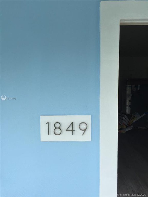 Fresh paint inside and out and new wood floors on this remodeled home in downtown Hollywood