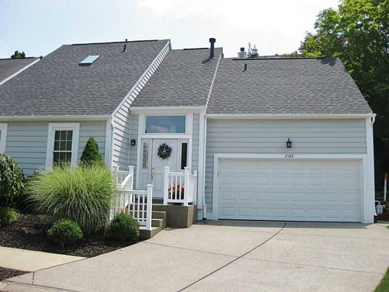 Exterior Front. Maintenance free living in this we