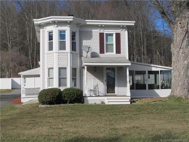 Exterior front of this charming Italianate style V