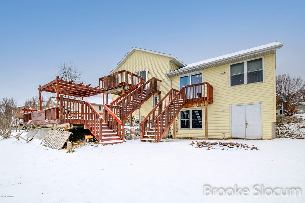 8693 Carlisle Dr SW, Byron Center, MI 49315 - photo 1