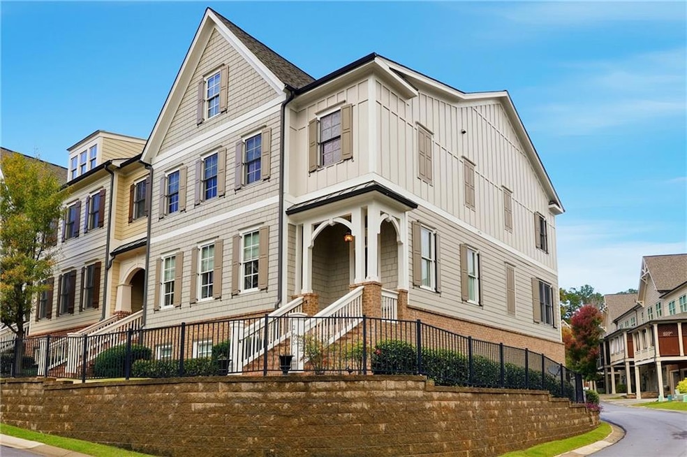 View of front facade with board and batten siding, a residential view, and brick siding