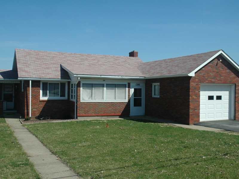 Exterior Front. Brick Ranch with attached 1 car ga