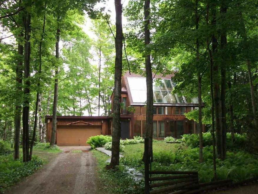 11062 Spring St, Charlevoix, MI 49720 - photo 1