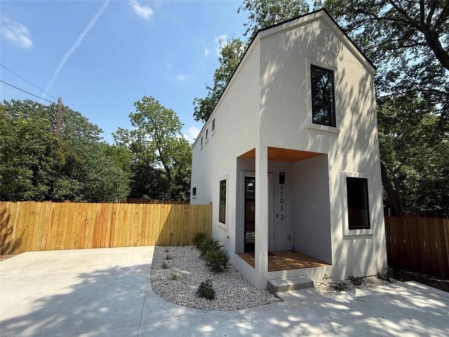 Contemporary home featuring fence, a patio, and s