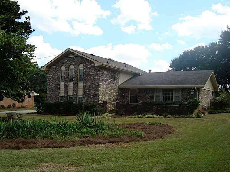 Exterior Front. All brick split level with spaciou