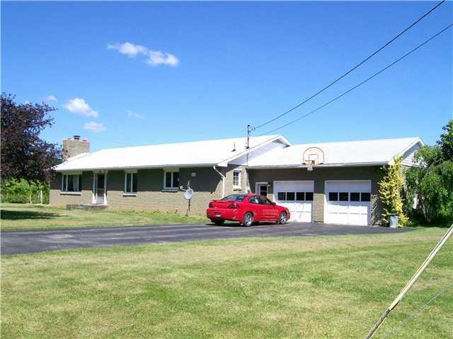 Exterior Front Inviting Spacious ranch home on a c