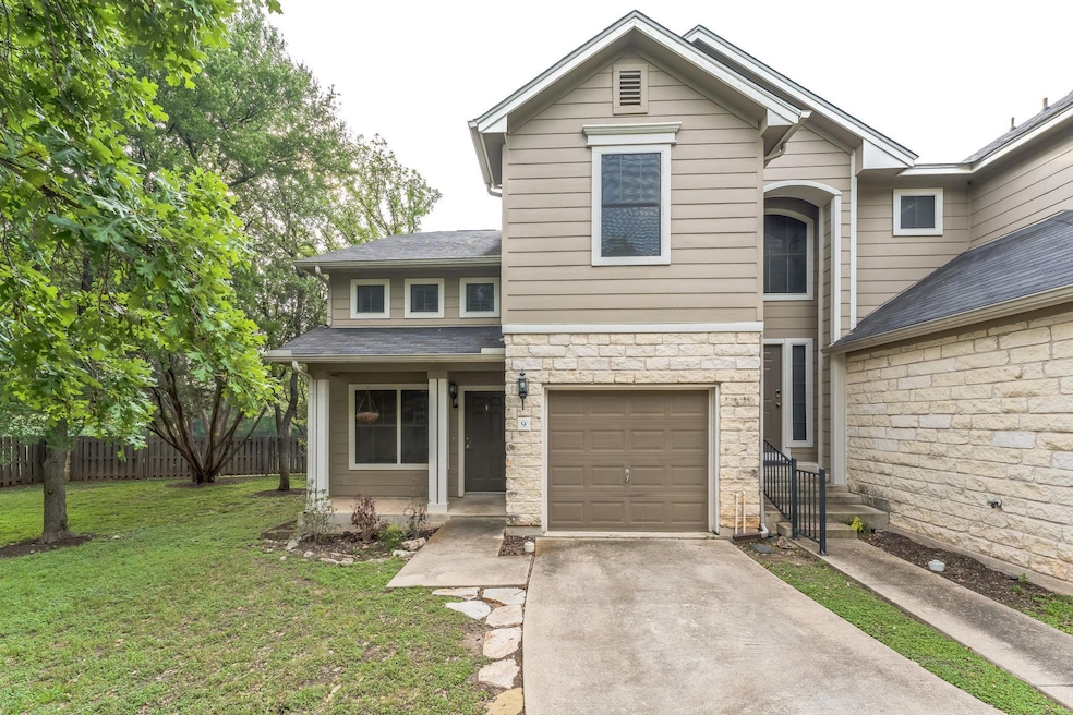 View of front of home featuring concrete driveway