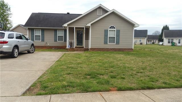 Front of house well manicured lawn