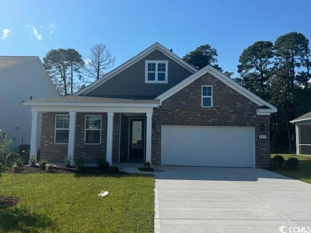 View of front of property featuring covered porch,