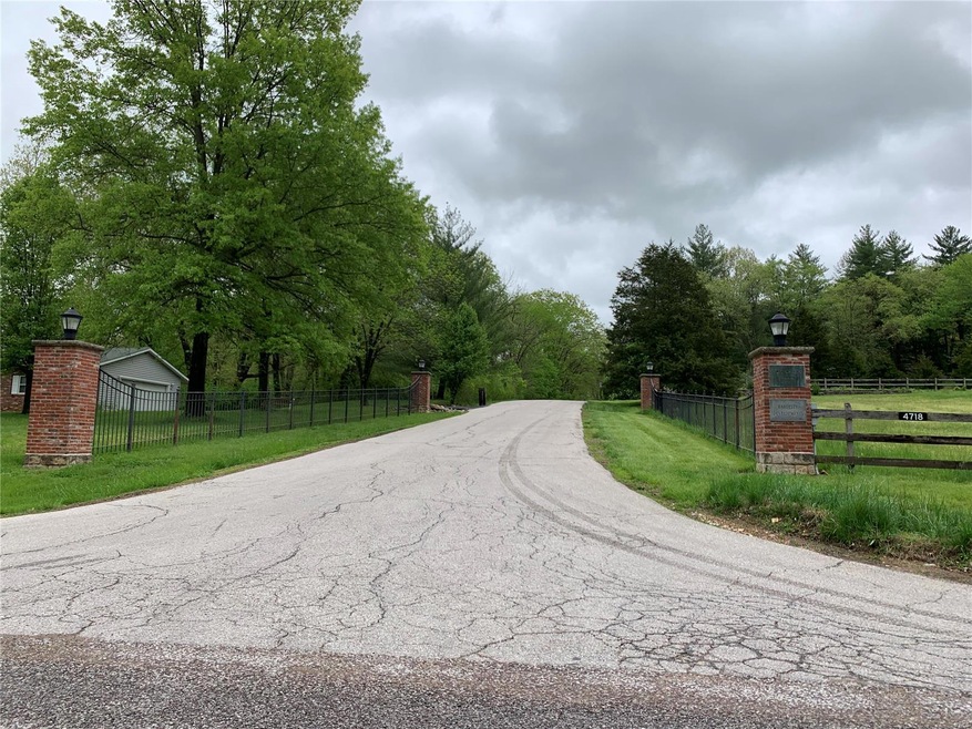 Entrance to 3.01 acre lot in Fox Creek Valley.