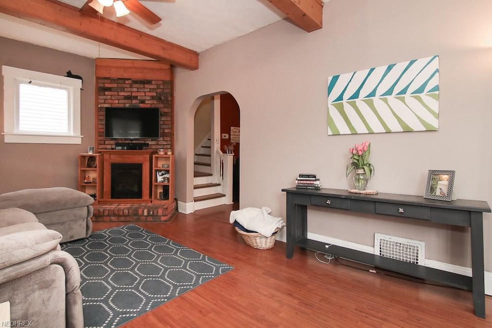 Cozy fireplace in the warm and welcoming family room