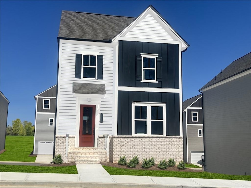 View of front of property featuring brick siding, 