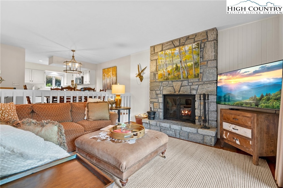 Comfortable living room with wood burning fireplac