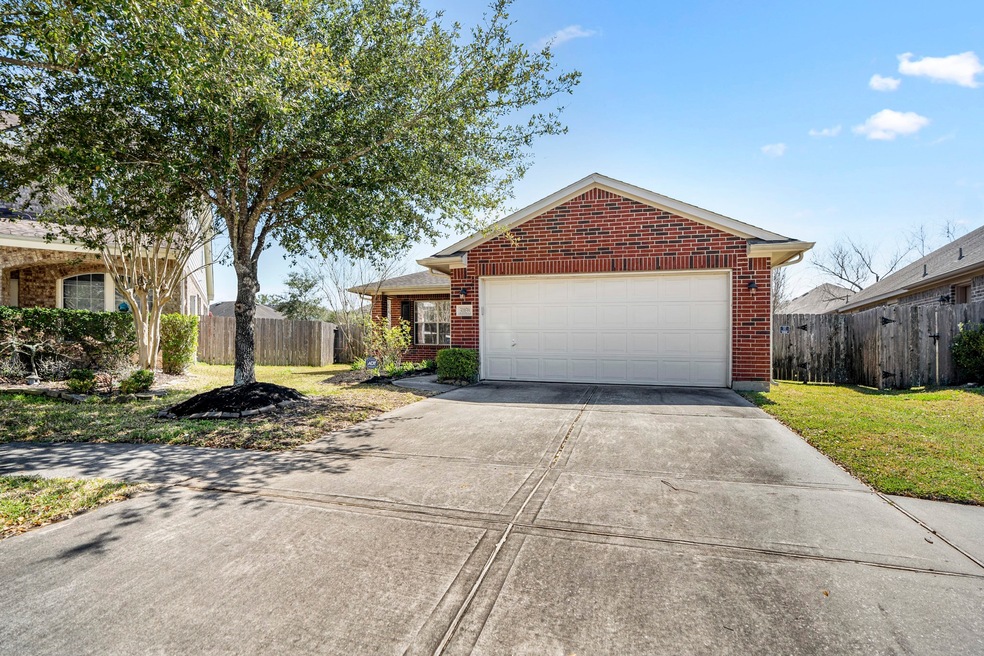 31039 Sundance Woods Ct, Spring, TX 77386 - photo 1