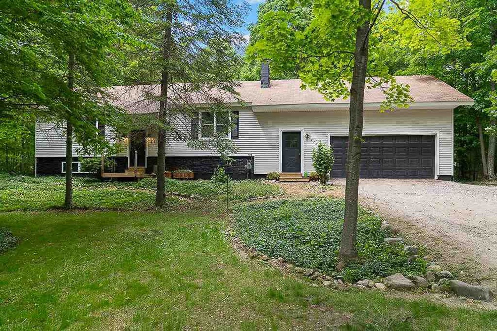 7665 Major Douglas Sloan Rd, Charlevoix, MI 49720 - photo 1