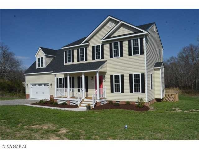 Exterior Front - Photos are of model home, feature