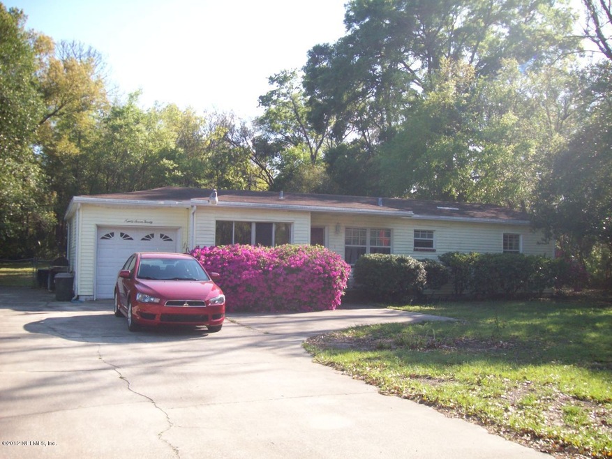 9720 Cunningham Rd, Jacksonville, FL 32246 - photo 1