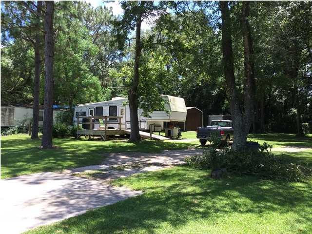A really lovely shaded lot, with lots of establish