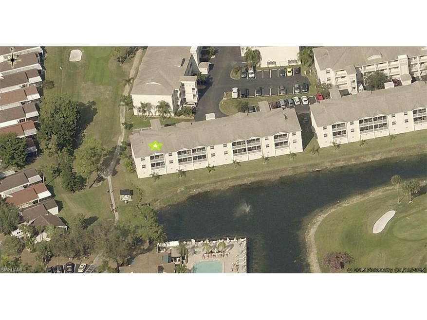 Aerial of southern exposure overlooking pool and g