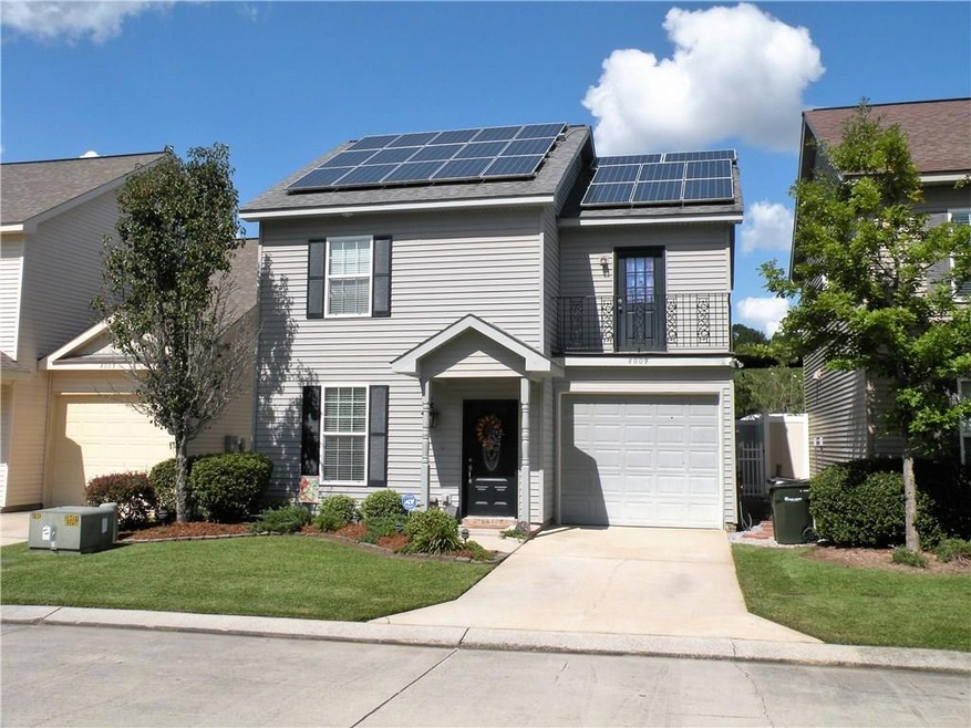 Immaculate garden home features central location,