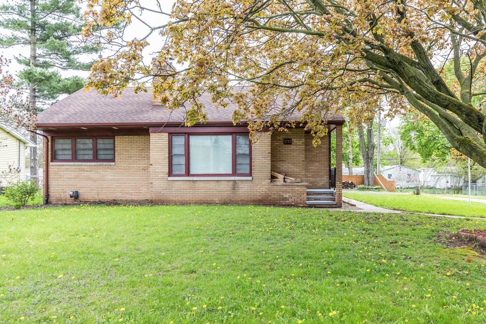 3713 W Holmes Rd, Lansing, MI 48911 - photo 1