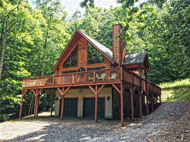 Beautiful log home with two car garage