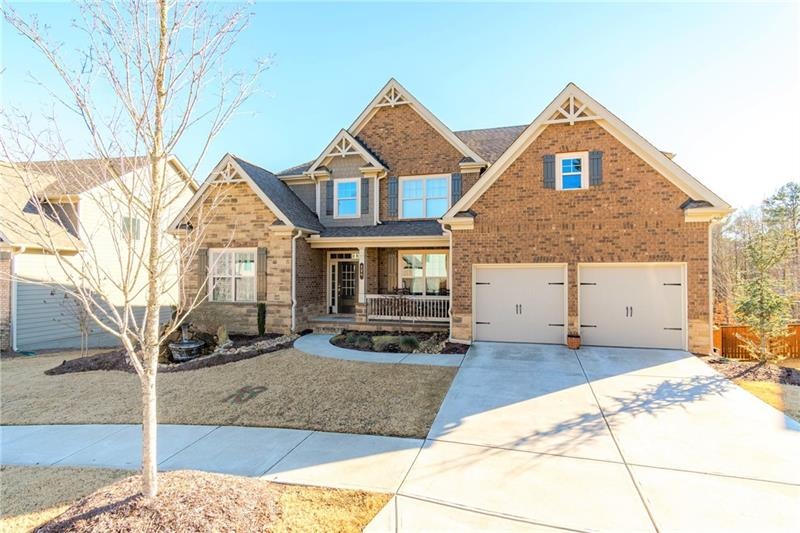 Stately Brick & Stone Craftsman Style Home with Co