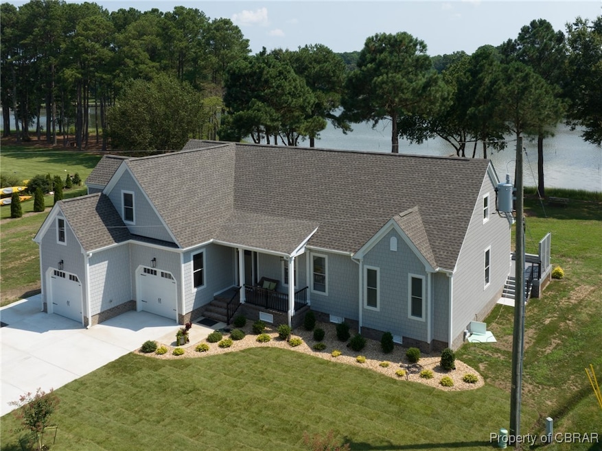 View of front facade featuring a garage and a fron