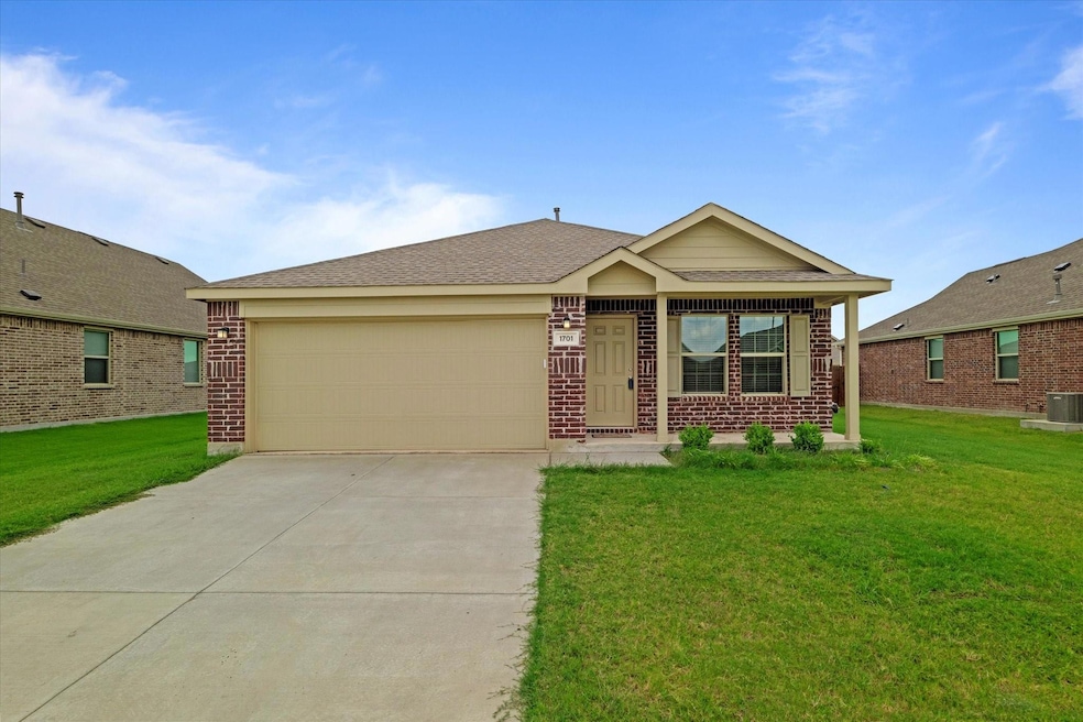 Ranch-style house featuring a garage, covered porc